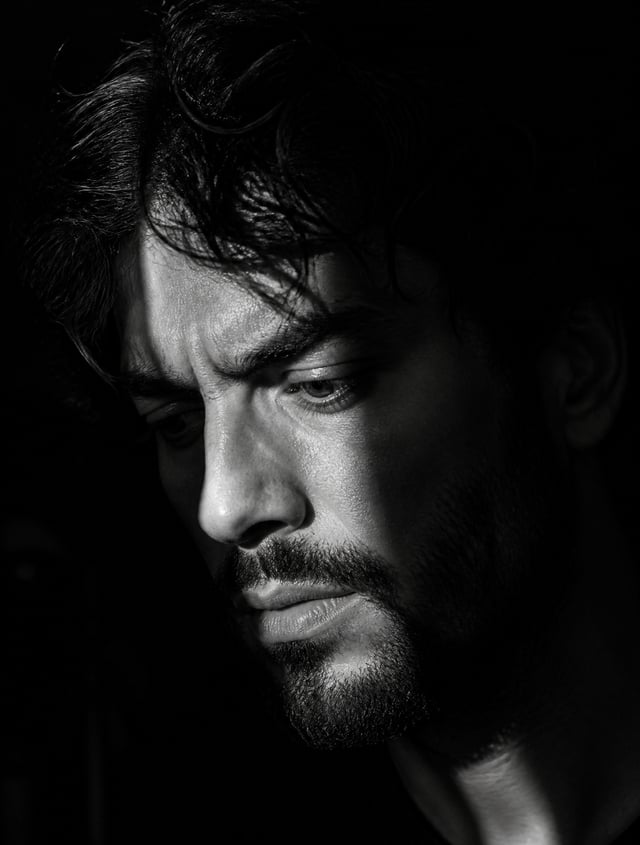 Close-up black and white portrait of a man use image face reference with messy hair and a rough bear