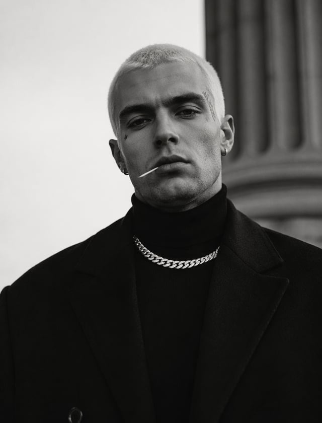 Ultra-realistic fashion black and white portrait of a man with short light hair buzzcut white hair ,