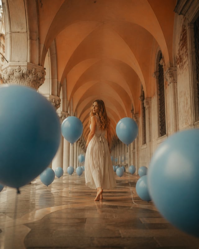 Vertical cinematic portrait photography in European arched corridor, warm orange vaulted tunnel, vin