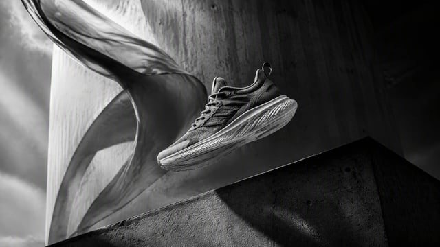 16:9 black-and-white cinematic commercial photograph, premium luxury advertising aesthetic.An extrao