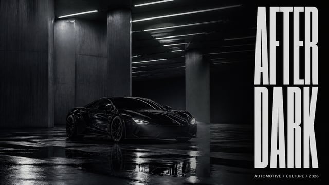 Black exotic supercar parked alone inside an enormous empty underground architectural space at night