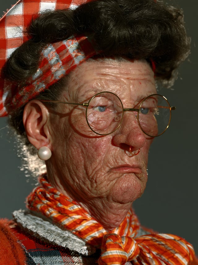 Hyper-realistic yearbook photo of a fictional, eccentric woman character in a comedic style; exagger