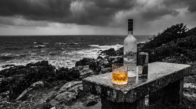 A cinematic, photorealistic photograph featuring a dramatic selective color effect. In the foregroun
