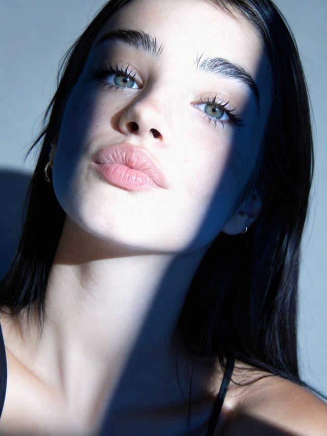 Ultra-realistic beauty portrait captured in a tight close-up with a full-frame mirrorless camera and
