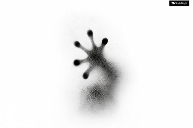 Abstract [Your Subject]  formed from thousands of soft black spray particles, fading into a pure whi