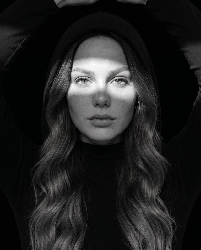Ultra-realistic fine art black-and-white portrait, editorial fashion photography, close-up centered 