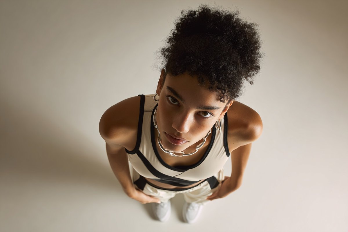 Subject Photographed From A 35-degree Overhead Angle, Standing Alone IN sample 2